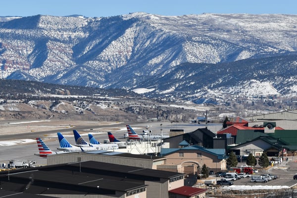 Colorado mountain regional airport terminal with commercial planes