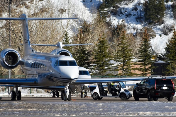 Private jet on a snowy Colorado mountain tarmac